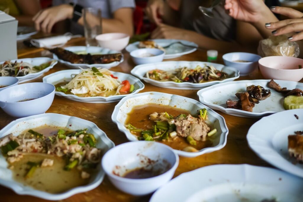 Plates of leftover food/food waste after meal